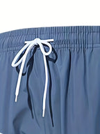 4-piece men's sportswear, stylish two tone hooded jacket and jogging pants with pockets, long sleeves, and drawstring