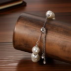 Women's faux pearl beaded bracelet watch, adjustable sliding clasp strap, quartz analog dial, faux diamond embellishments, Arabic numeral markers, stylish and exquisite, a perfect gift for girls and women