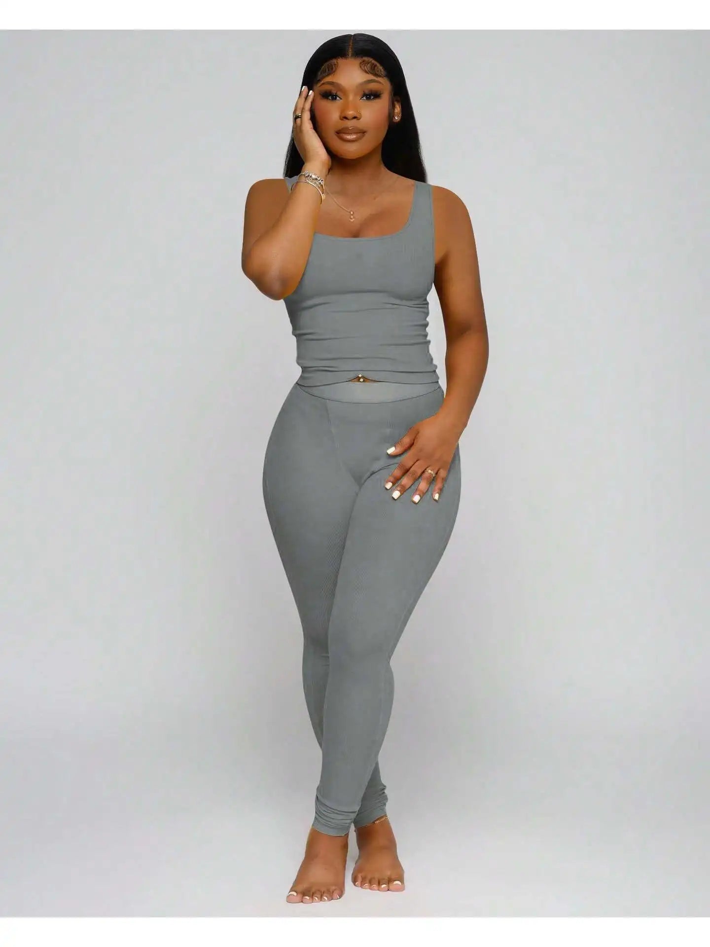 Women 2-Piece Activewear Set, ribbed crop tank top matched with high waist yoga leggings. Stretchy and skin-friendly fabric, snug fit, perfect for workout, yoga, gym training and daily casual leisure wear all day round