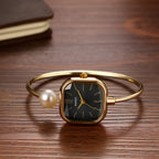 Elegant women's watch, featuring a simulated quartz square case, bar markers, and a bracelet design with imitation pearl embellishments; suitable for all seasons and professional settings