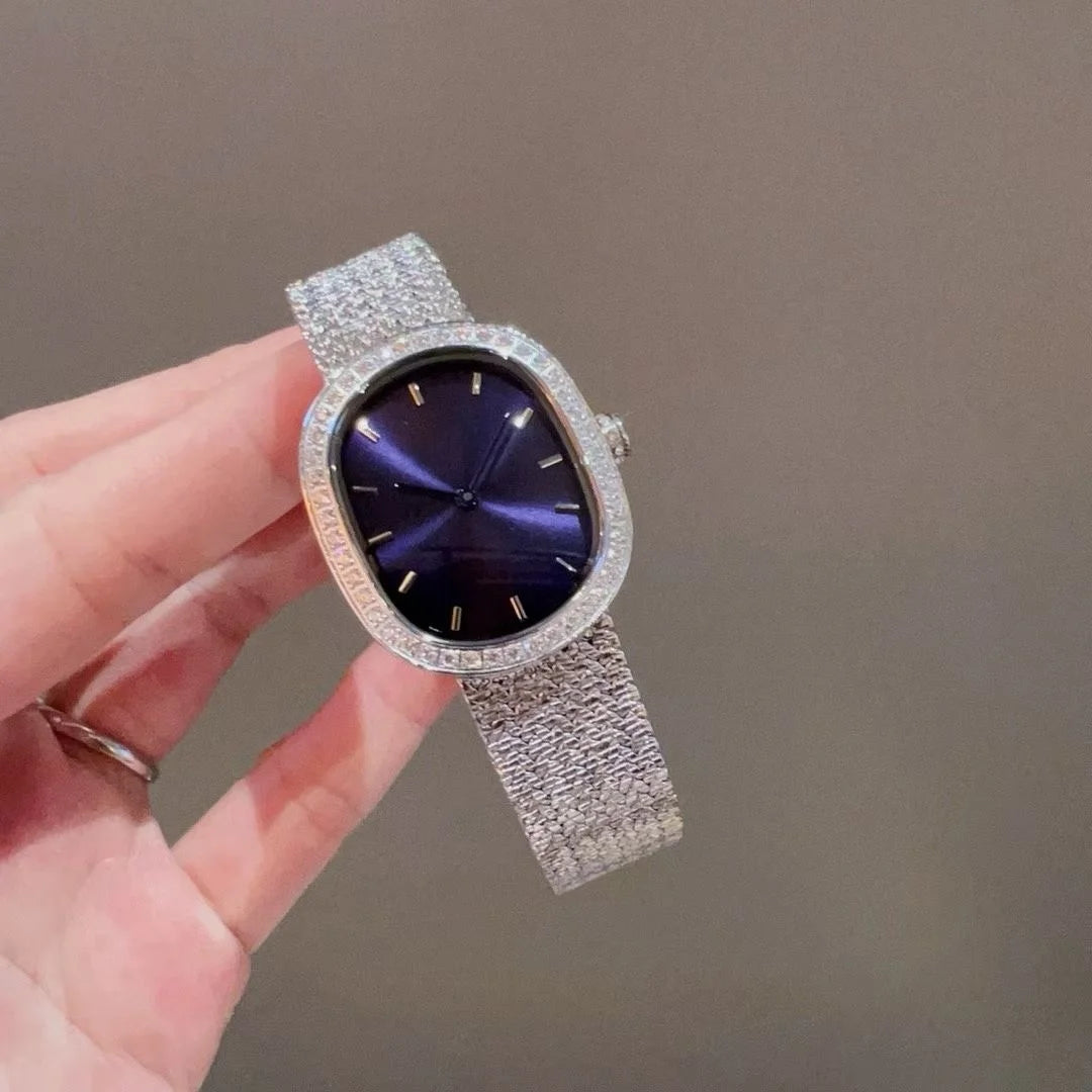 Women's Affordable Luxury Oval Rhinestone Watch: Sparkling Crystal Bezel, Laser-Etched Gradient Dial, Fine Steel Mesh Strap—A Simple and Stylish Women's Watch in Red, Purple, and Green