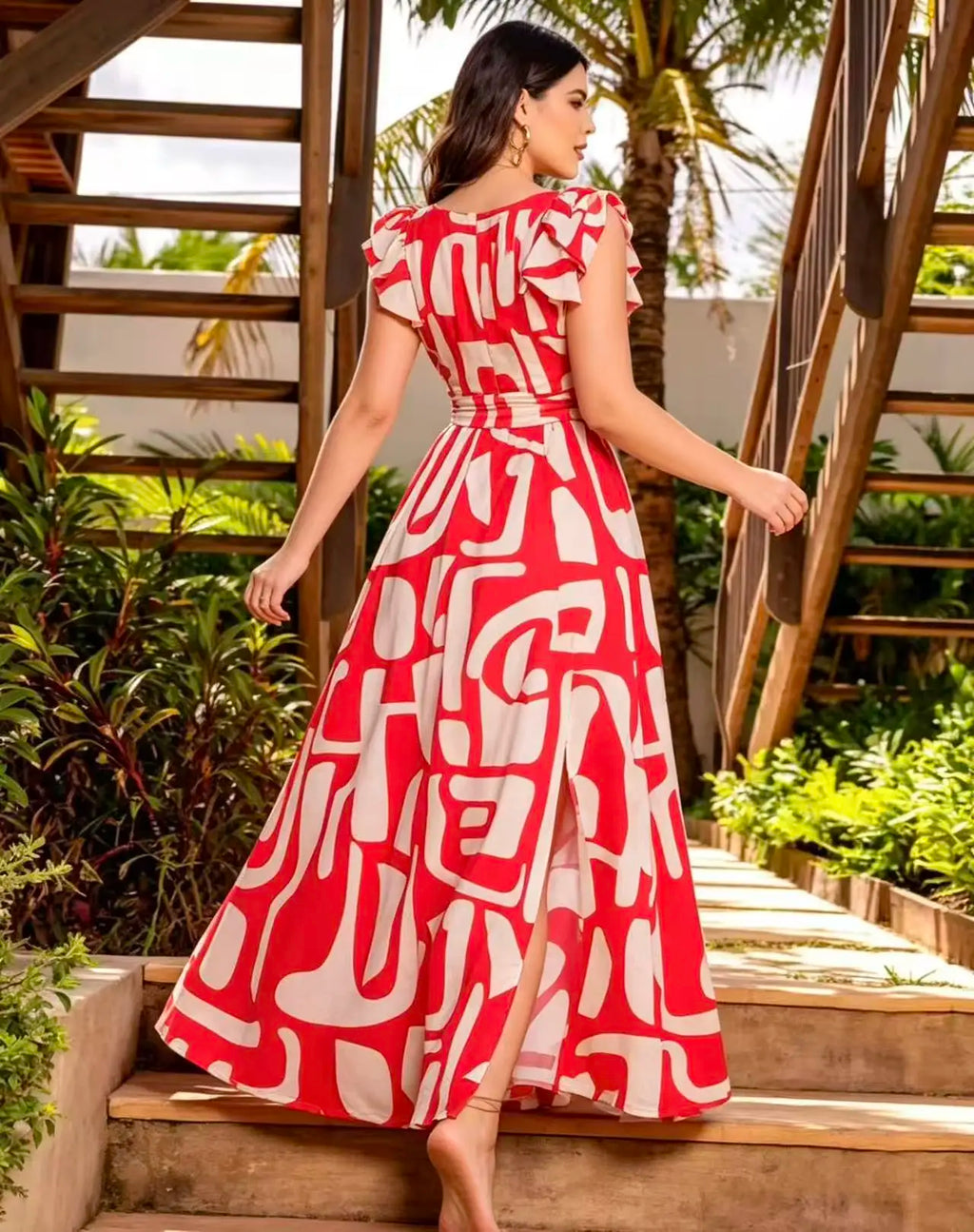 Plus size red and white geometric abstract print sleeveless maxi dress; single side bow waist cinching side slit flared hem vacation maxi dress