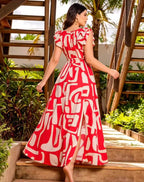 Plus size red and white geometric abstract print sleeveless maxi dress; single side bow waist cinching side slit flared hem vacation maxi dress