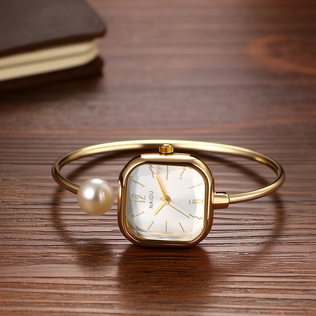 Elegant women's watch, featuring a simulated quartz square case, bar markers, and a bracelet design with imitation pearl embellishments; suitable for all seasons and professional settings