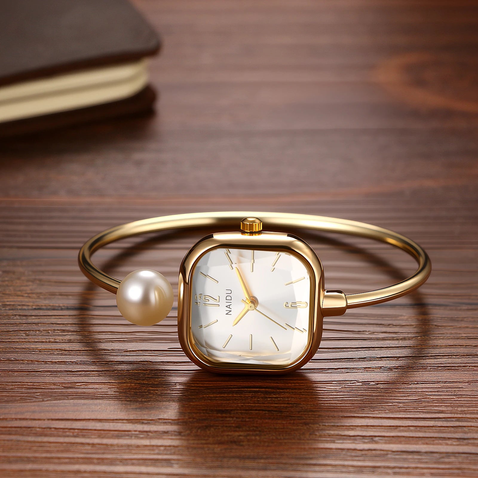 Elegant women's watch, featuring a simulated quartz square case, bar markers, and a bracelet design with imitation pearl embellishments; suitable for all seasons and professional settings