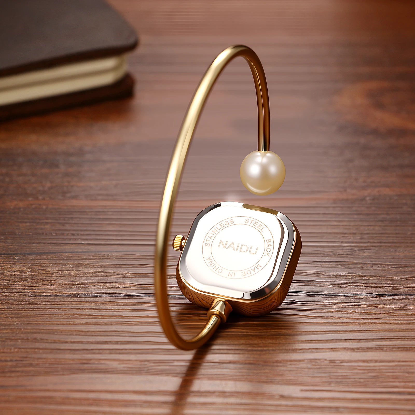 Elegant women's watch, featuring a simulated quartz square case, bar markers, and a bracelet design with imitation pearl embellishments; suitable for all seasons and professional settings