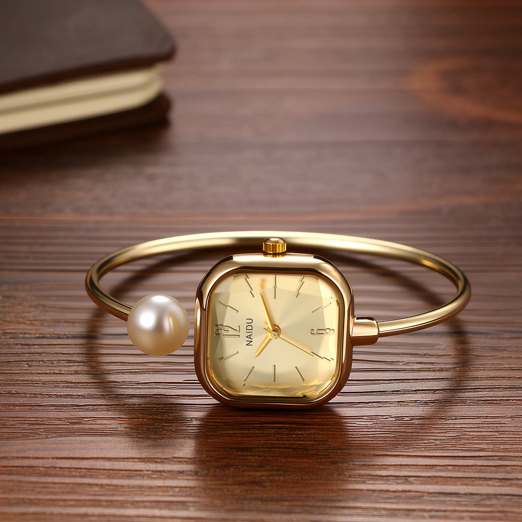 Elegant women's watch, featuring a simulated quartz square case, bar markers, and a bracelet design with imitation pearl embellishments; suitable for all seasons and professional settings