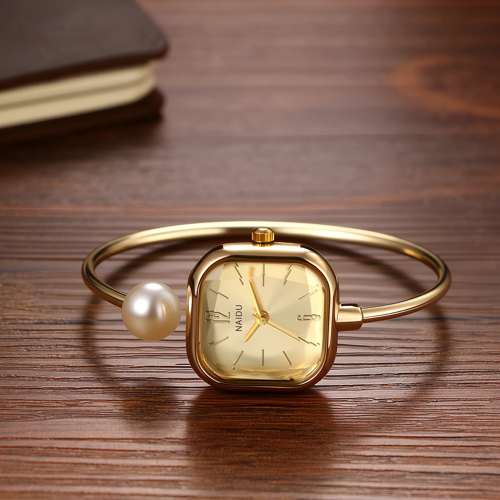 Elegant women's watch, featuring a simulated quartz square case, bar markers, and a bracelet design with imitation pearl embellishments; suitable for all seasons and professional settings